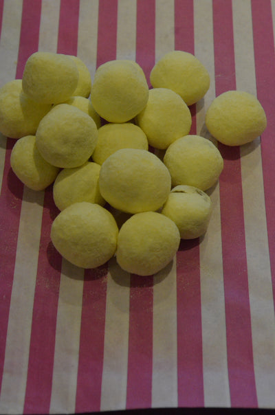 Traditional Lemon Bon Bons - Traditional dusted lemon flavoured bon bons with a devon toffee centre