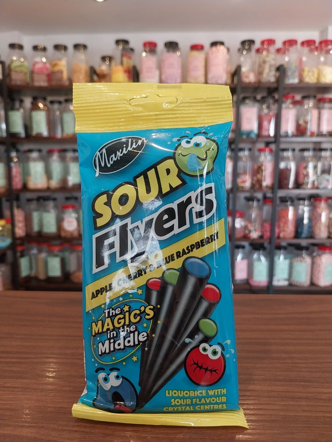 Sour Flyers (75g bag) - Liquorice sticks filled with sour fruit flavoured crystallised sugar centres